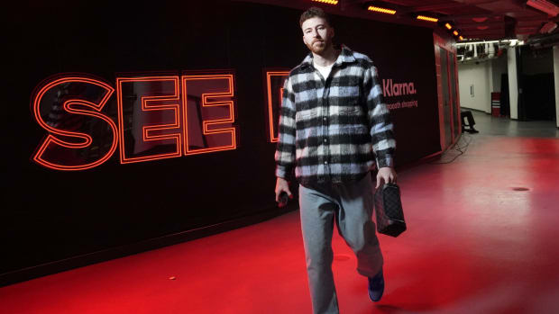 Chicago Bulls forward Onuralp Bitim (17) enters the building before the game against the Milwaukee Bucks at United Center.